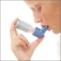 Picture of a person using an inhaler
