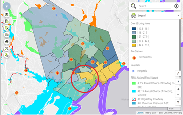 Map output from the EPPP tool for Lynn, MA illustrating census tracts by the amount of residents over 65 and living alone. Other map layers are on, such as locations of hospitals, fire stations, and FEMA flood hazards.