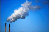 Picture of smokestacks emitting smoke, which pertain to the outdoor air quality indicators for ozone.